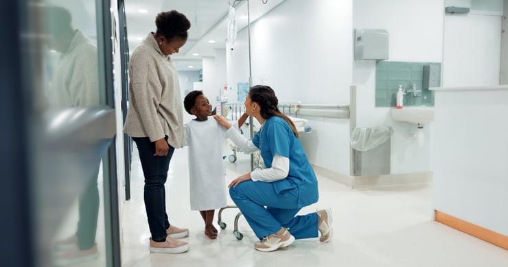 Physician calming child patient